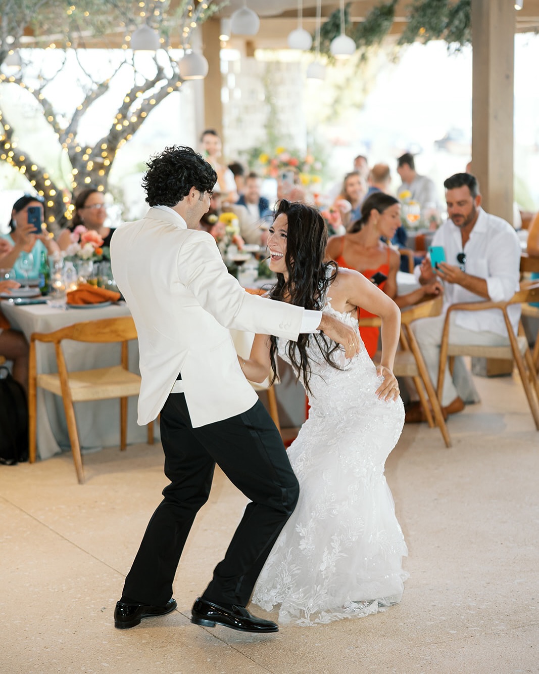 Couple's first dance at their wedding reception at SeaRocks Paros beach venue