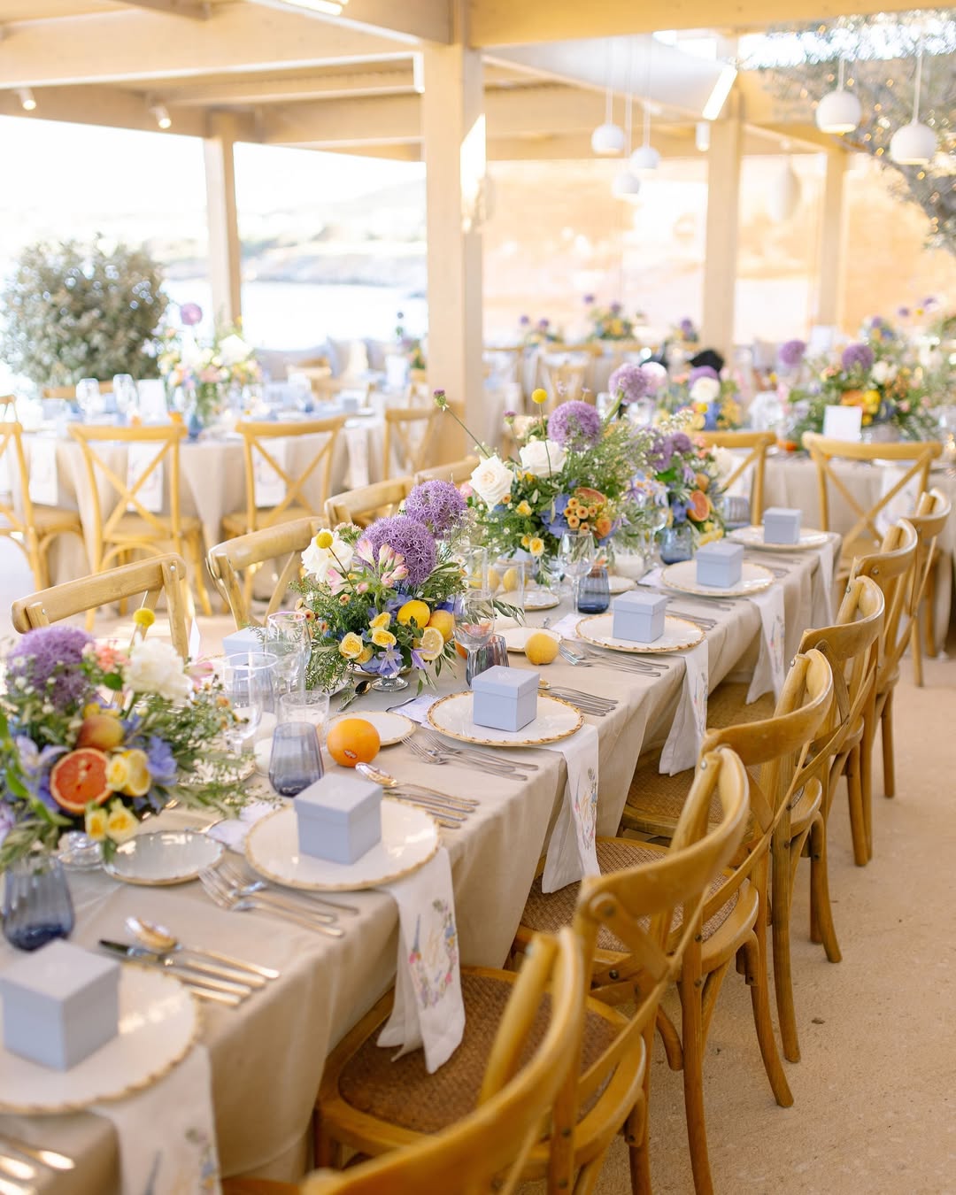 Private dining table by the sea at SeaRocks Paros